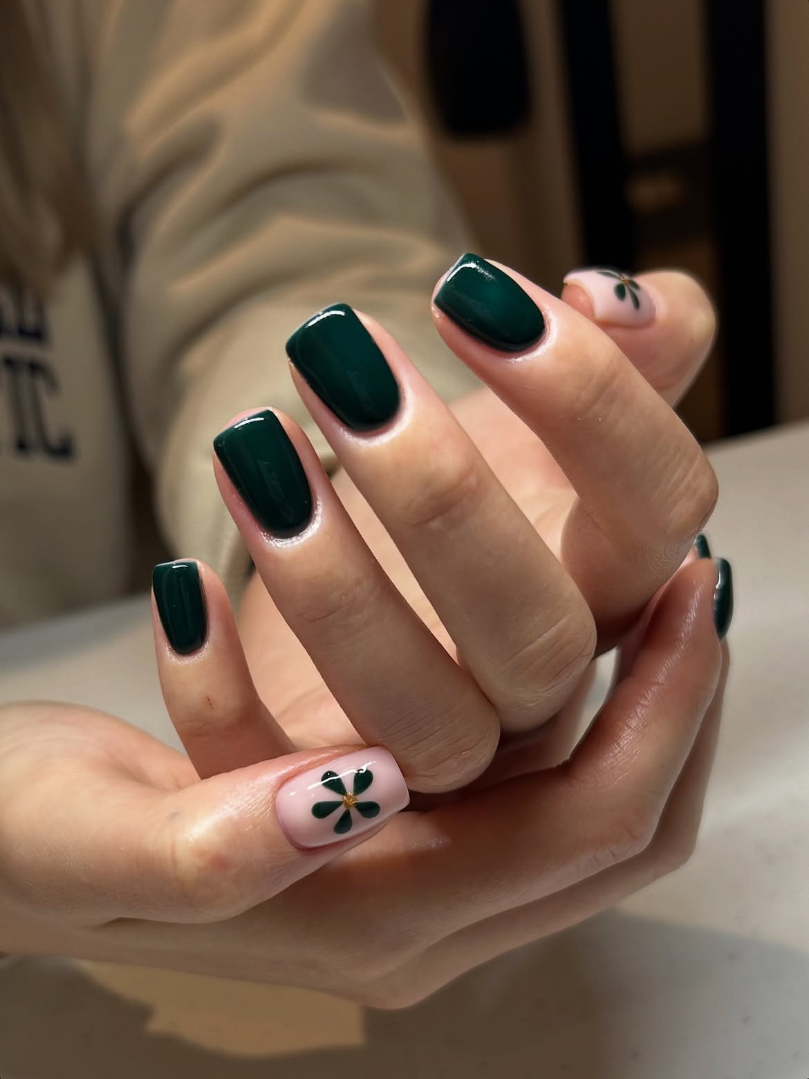 Glossy Dark Green Nails With Botanical Accent Art