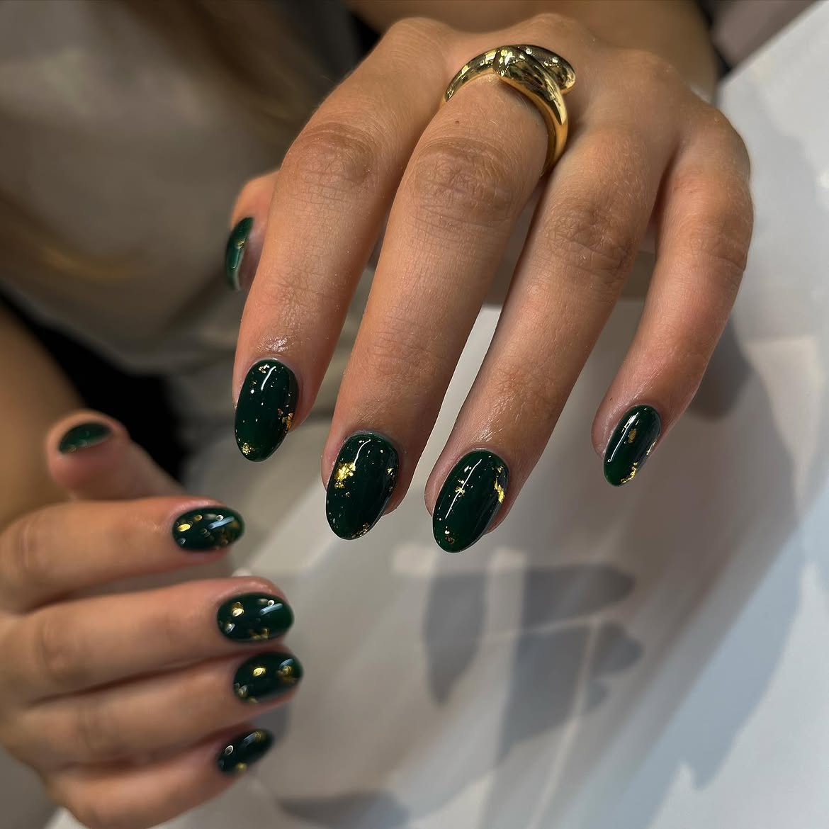 Glossy Dark Green Nails With Gold Flakes