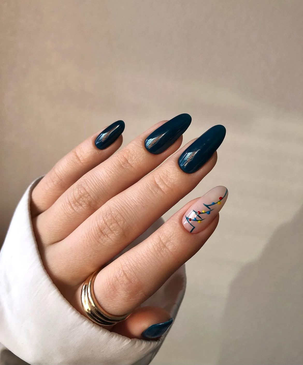 Glossy Dark Teal and Christmas Light Almond Nails
