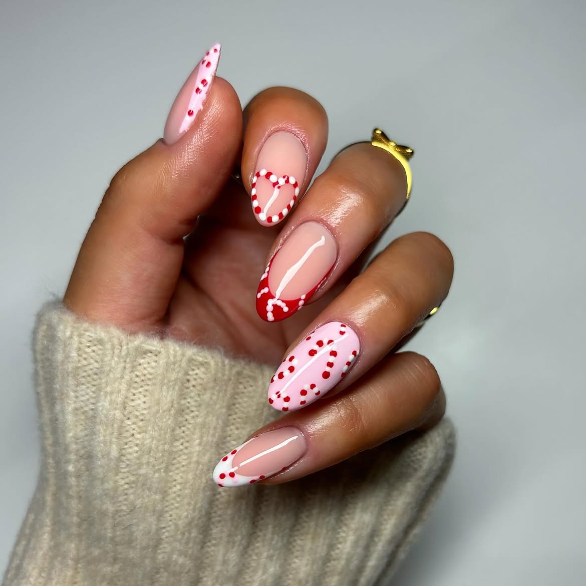 Glossy Festive Candy Cane Almond Nail Art