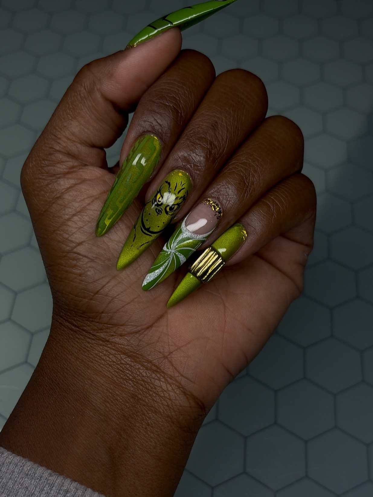 Glossy Grinch Holiday Stiletto Nail Art