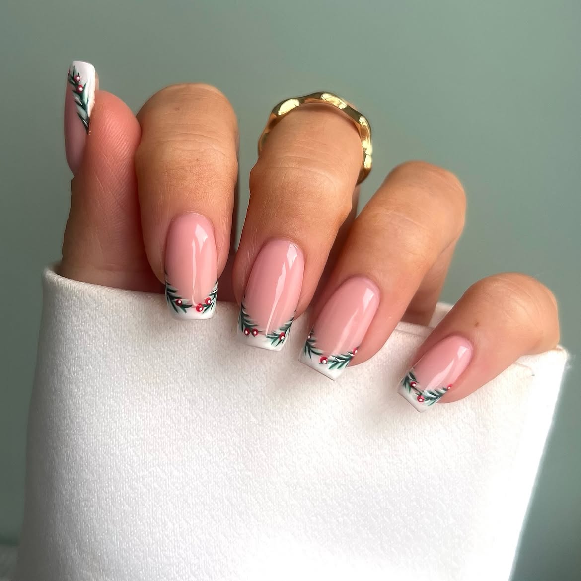 Glossy Nude Christmas French Tips With Holly