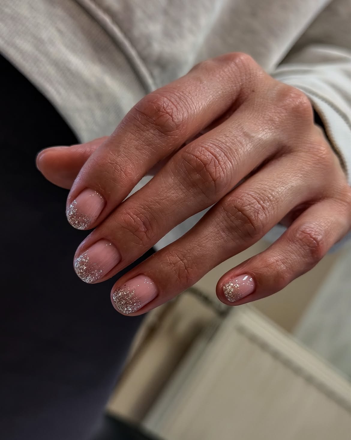 Glossy Nude Nails With Silver Glitter Gradient Tips