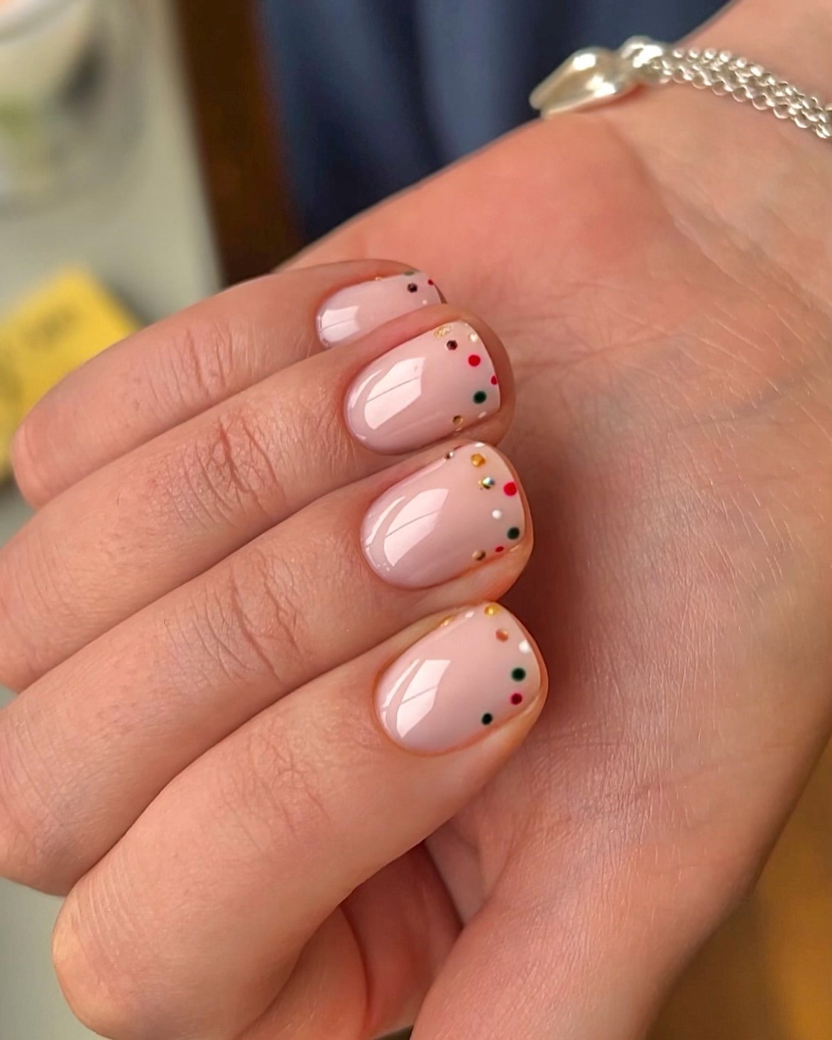 Glossy Nude Short Squoval Nails With Festive Dots
