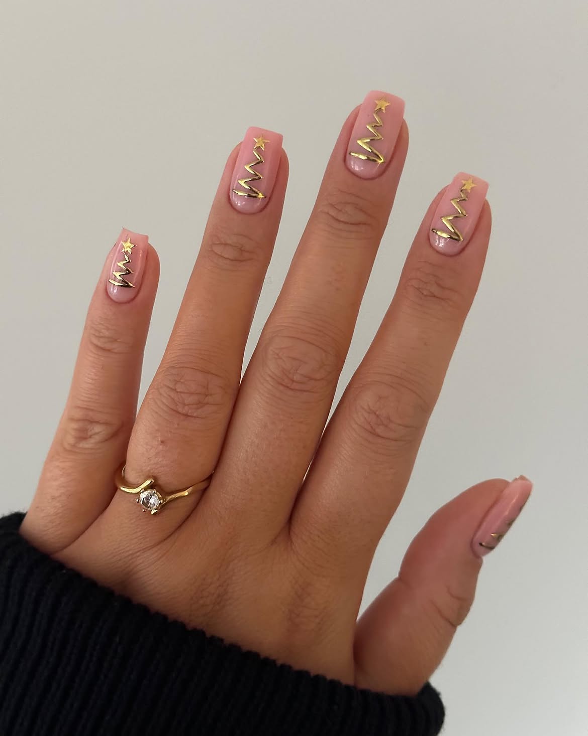 Glossy Pink Squoval Nails With Gold Christmas Tree Art