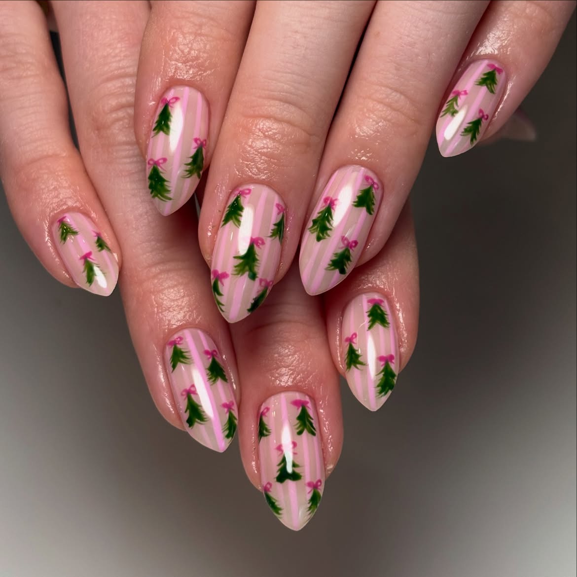 Glossy Pink Striped Christmas Tree Almond Nails