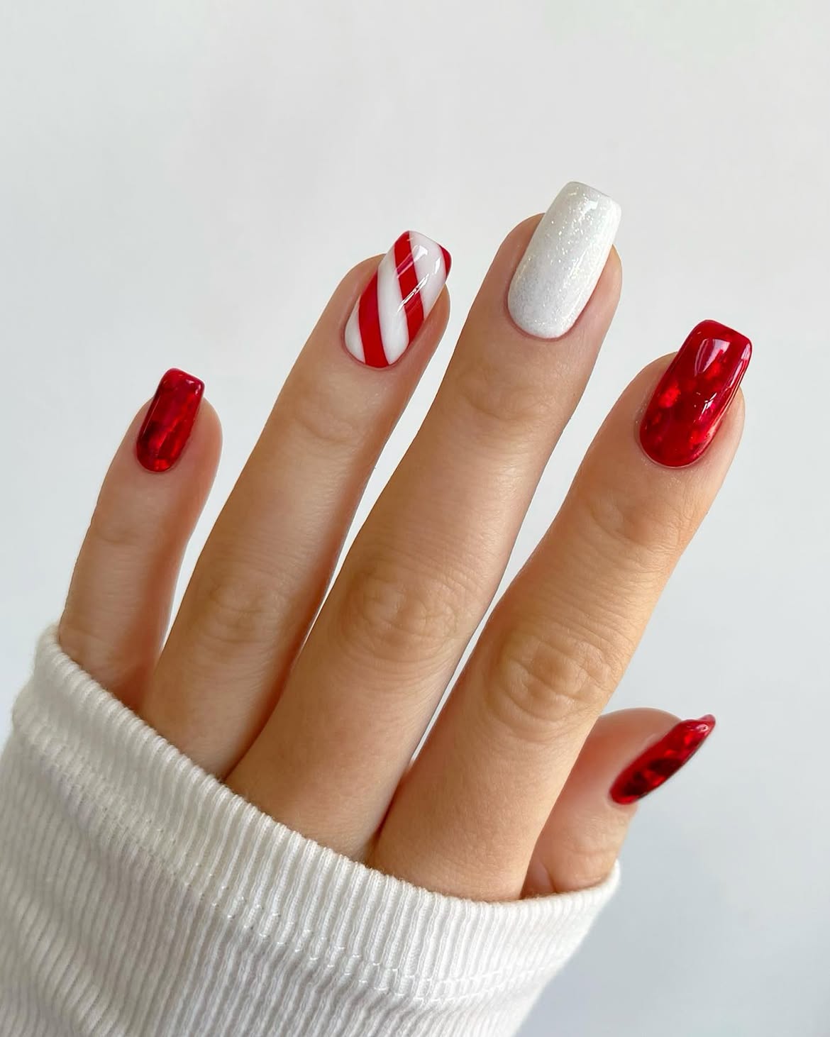 Glossy Red Candy Cane Swirl Christmas Nails