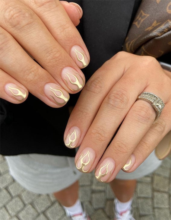 Short Oval Gold Flame Tip Nails Short Oval Gold Flame Tip Nails — Gold Chrome Nails