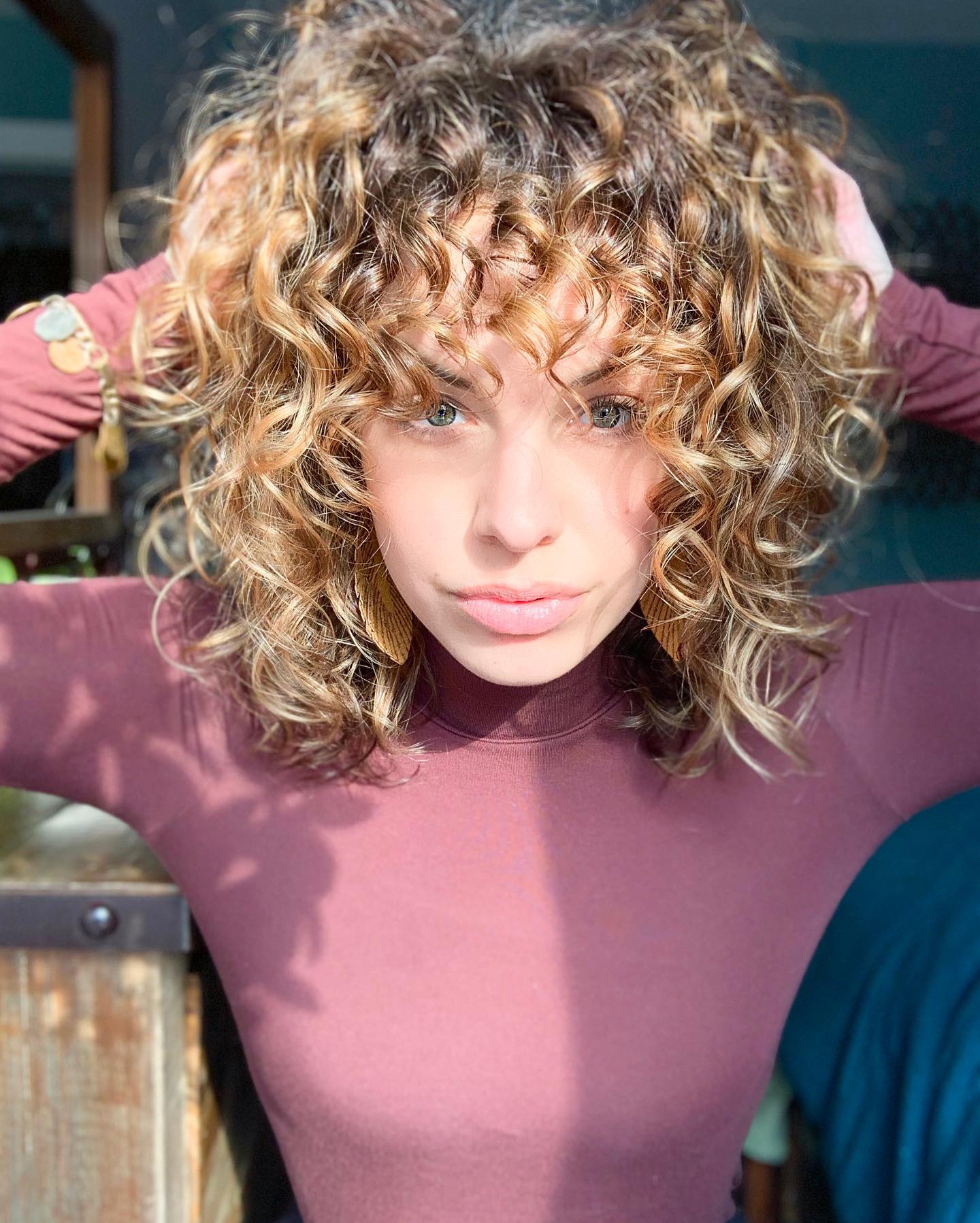 Golden Honey Blonde Curly Shag With Face-Framing Layers
