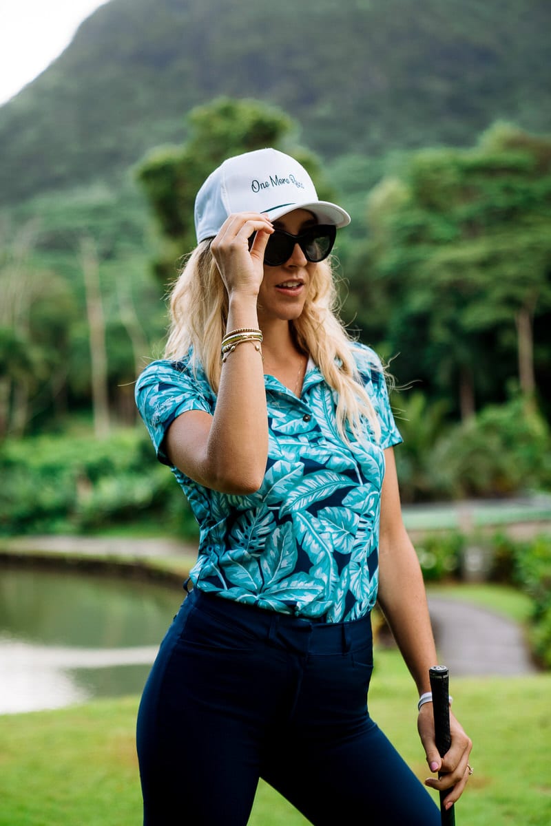 Teal tropical print polo with navy pants Teal tropical print polo with navy pants — Golf Outfits
