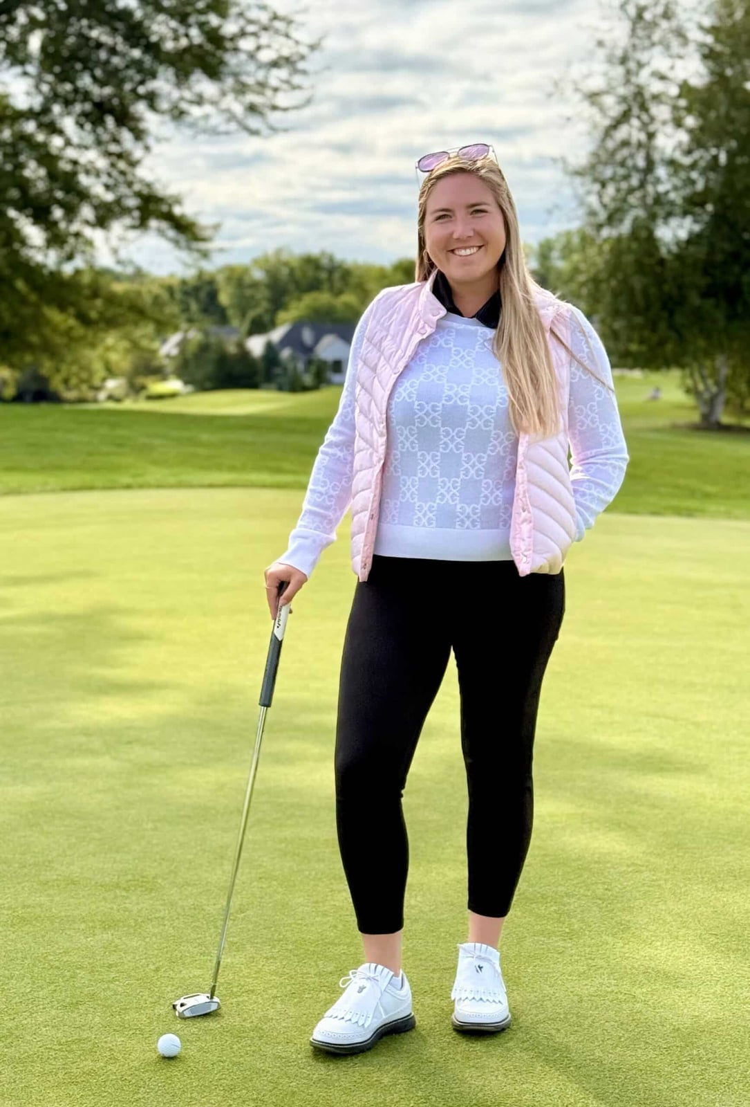 White patterned sweater, pink puffer vest, and black leggings White patterned sweater, pink puffer vest, and black leggings — Golf Outfits