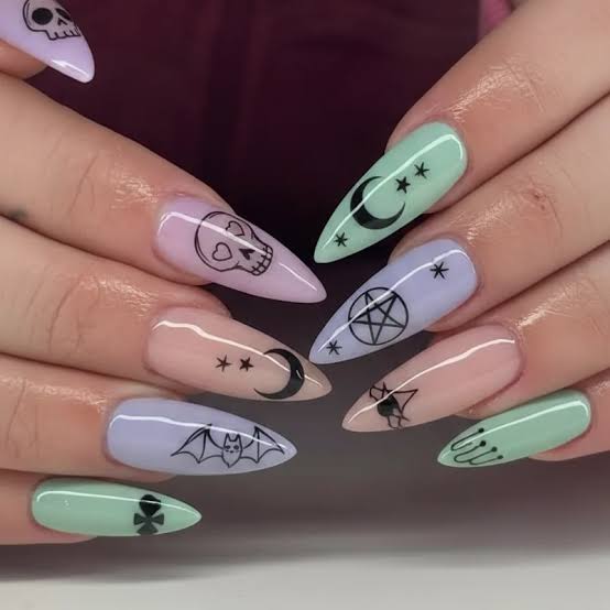 Medium Almond Pastel Nails With Gothic Symbols Medium Almond Pastel Nails With Gothic Symbols — Goth Nails