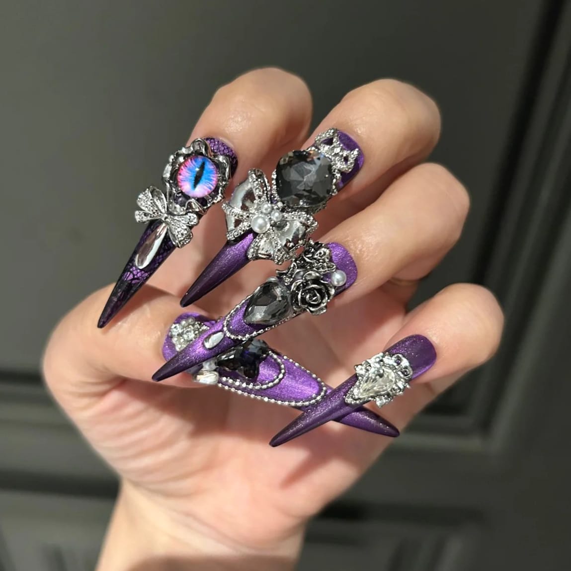 Purple Stiletto Nails With Mixed 3D Charms Purple Stiletto Nails With Mixed 3D Charms — Goth Nails