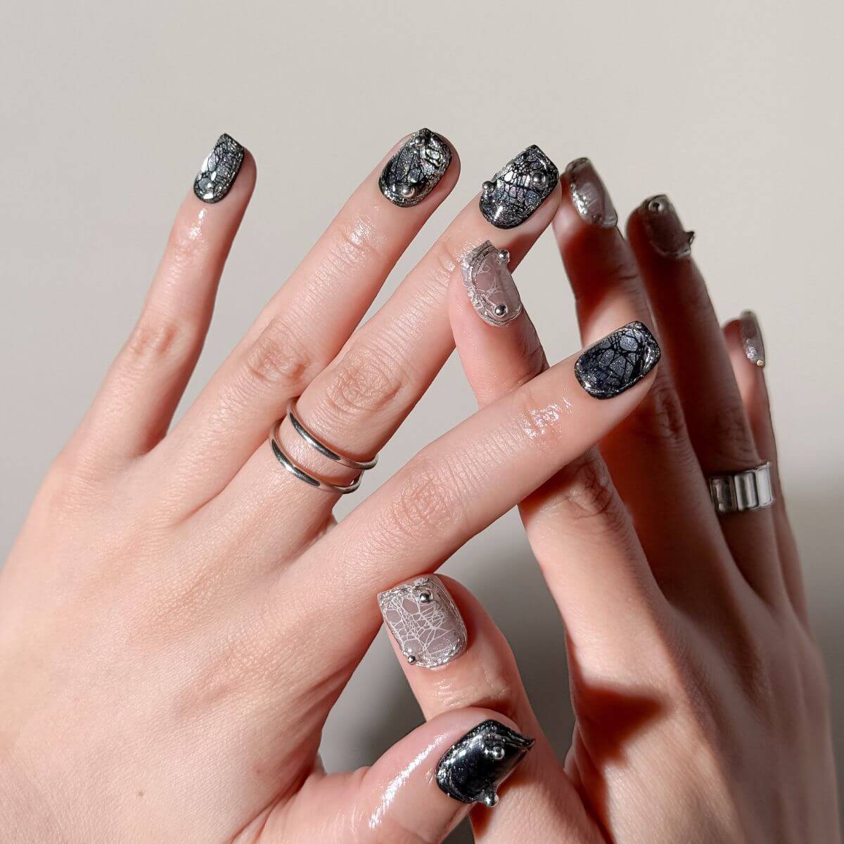 Black and Silver Chrome Long Stiletto Nails with Accents, Short Oval Black and Silver Chrome Long Stiletto Nails with Accents, Short Oval — Gothic Nails