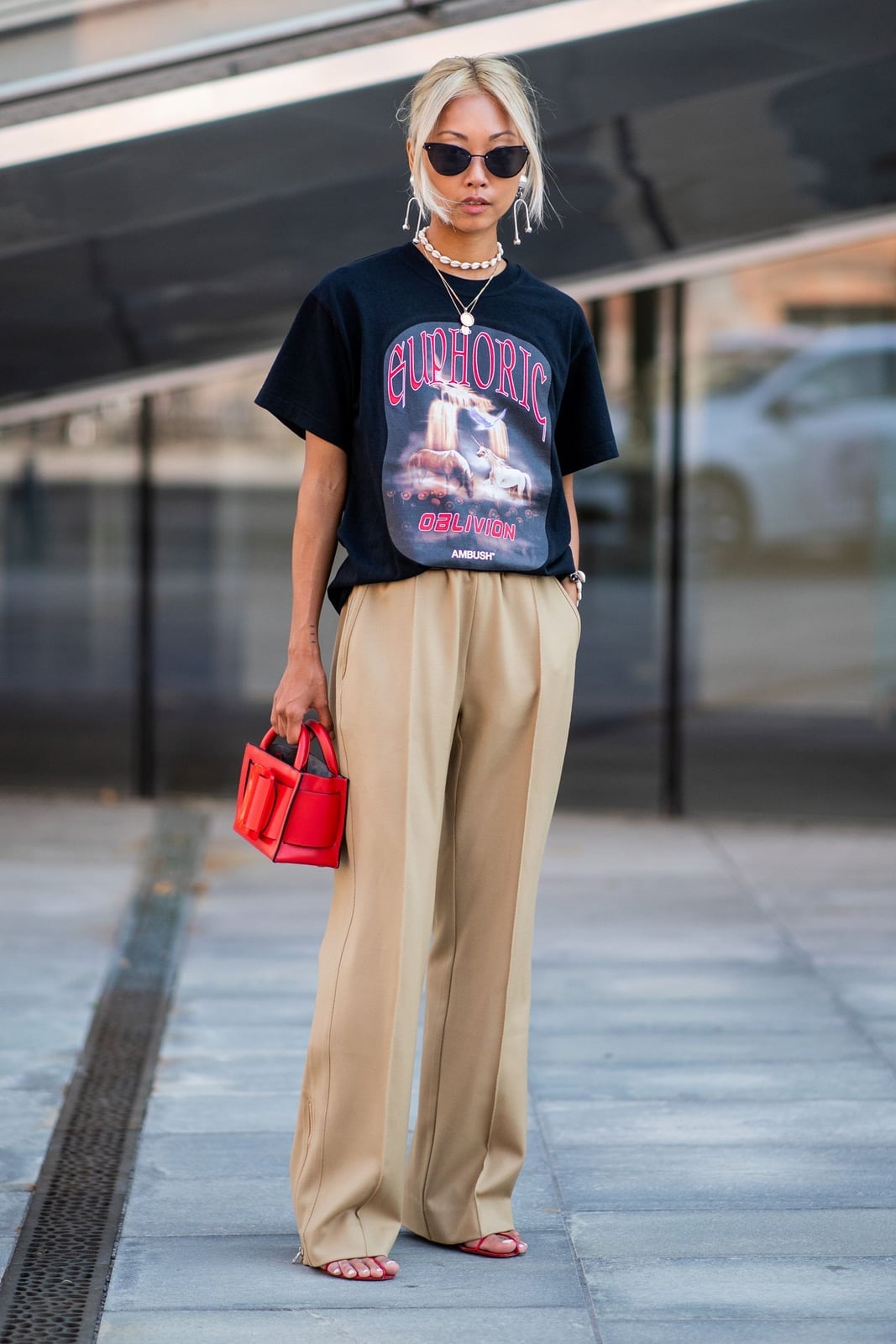Graphic Tee With Wide Leg Trousers And Red Accents Graphic Tee With Wide Leg Trousers And Red Accents — Graphic Tee Outfits