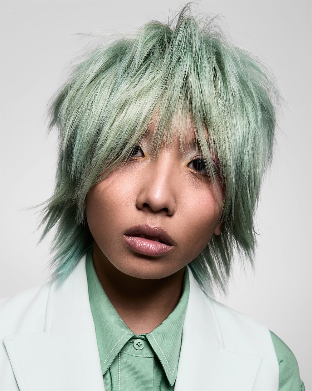 Mint Green Shag With Blonde Highlights Mint Green Shag With Blonde Highlights — Green Hair