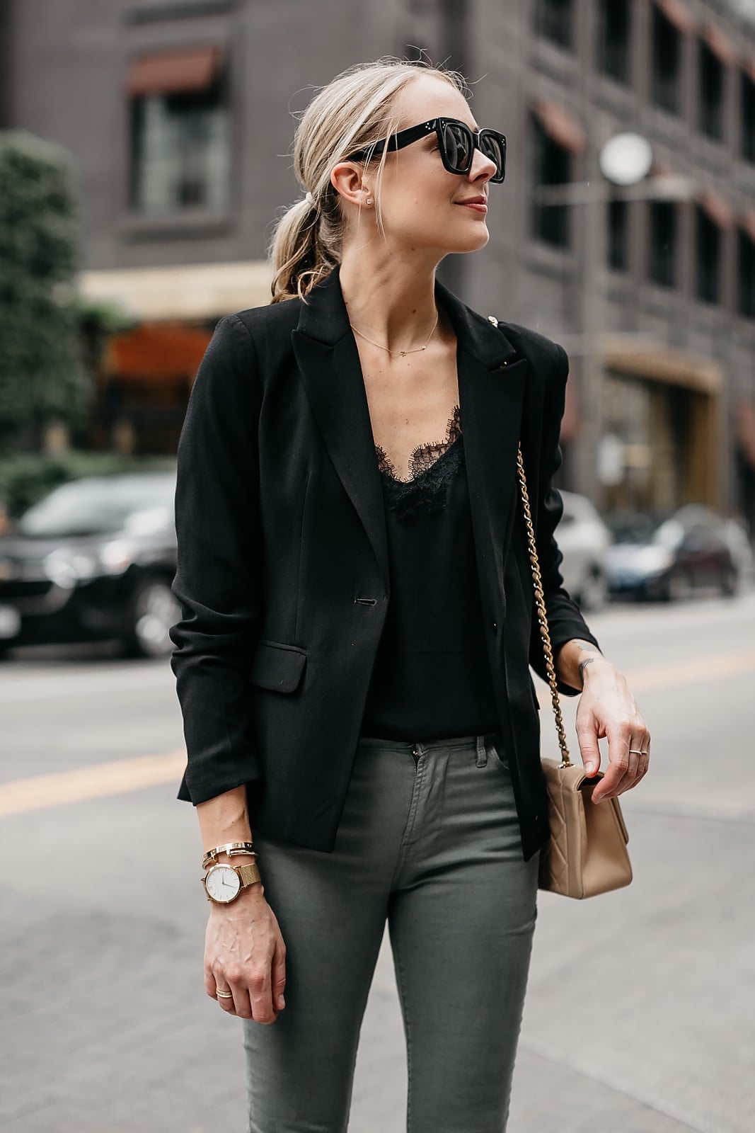 Olive Green Skinny Jeans With Black Blazer, Close-Up Take Olive Green Skinny Jeans With Black Blazer, Close-Up Take — Green Jeans Outfits
