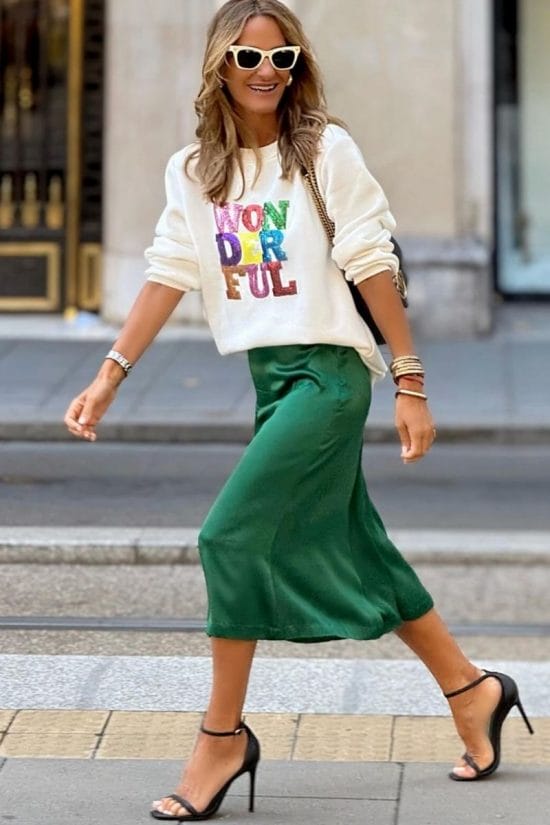 Emerald Green Satin Midi Skirt With Graphic Sweatshirt Emerald Green Satin Midi Skirt With Graphic Sweatshirt — Green Skirt Outfit