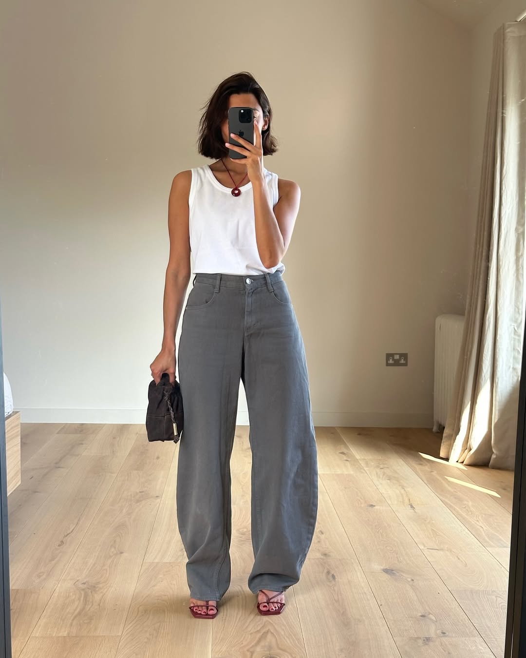 Gray Wide Leg Jeans With White Sleeveless Top And Strappy Sandals Gray Wide Leg Jeans With White Sleeveless Top And Strappy Sandals — Grey Jeans Outfits