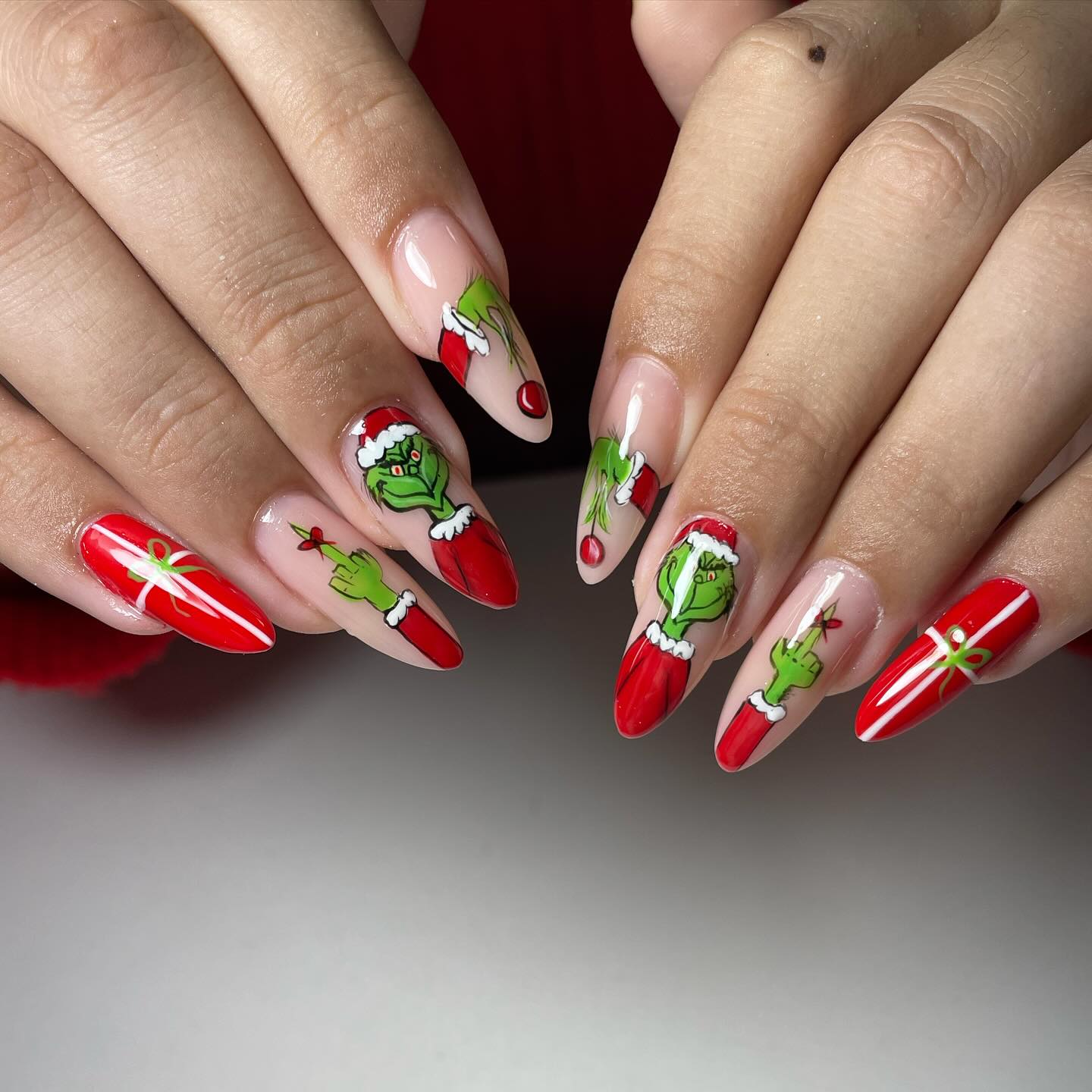 Grinch Christmas Nail Art With Red Present Accent