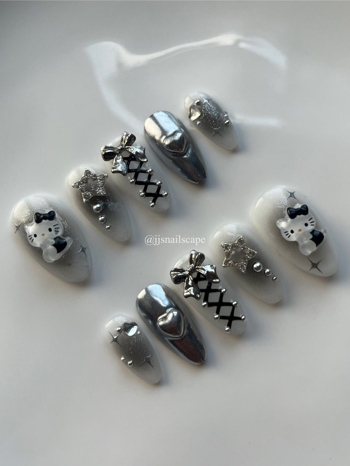 Silver Chrome 3D Hello Kitty Almond Nails Silver Chrome 3D Hello Kitty Almond Nails — Hello Kitty Nails