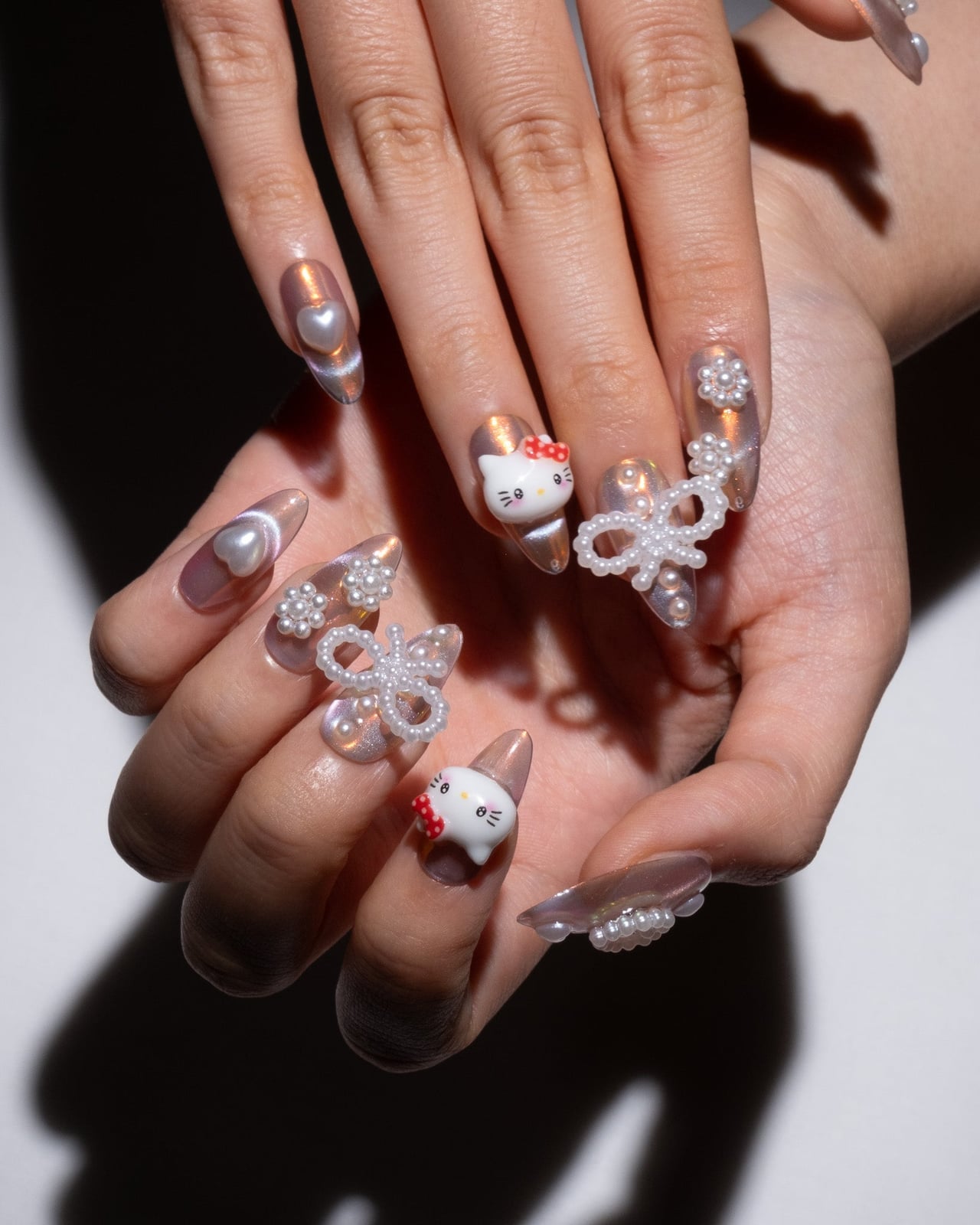 3D Pearlescent Hello Kitty Almond Nails 3D Pearlescent Hello Kitty Almond Nails — Hello Kitty Nails
