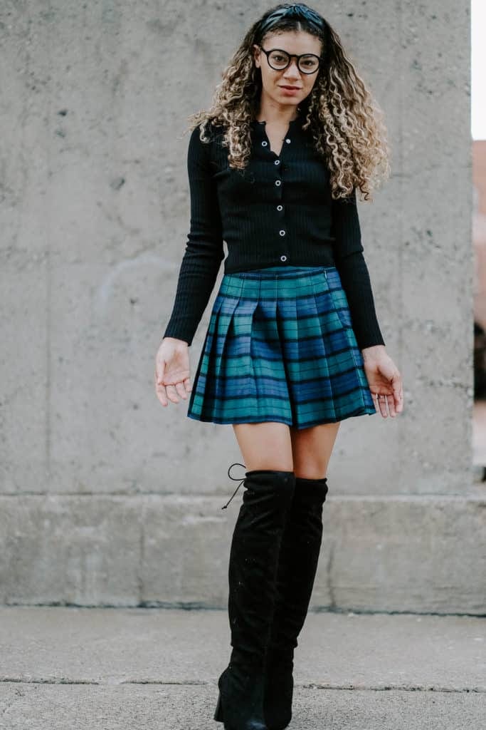 Button-Up Cardigan Over Plaid Pleated Mini Skirt Button-Up Cardigan Over Plaid Pleated Mini Skirt — High School Outfits
