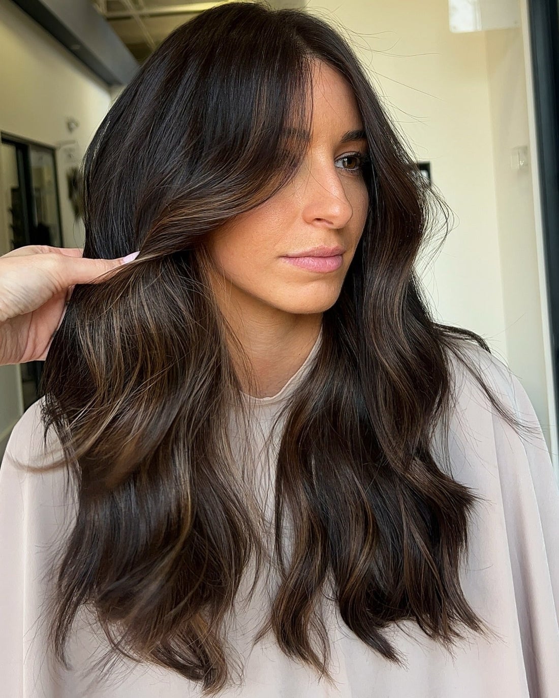 Collarbone Length Waves With Ash Brown Highlights And Curtain Bangs Collarbone Length Waves With Ash Brown Highlights And Curtain Bangs — Highlights on Brown Hair
