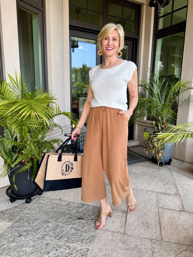 White cap-sleeve top with tan wide-leg culottes for resort wear Hot Weather Outfits