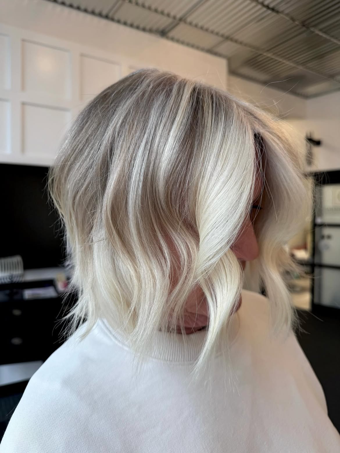 Ice Blonde Balayage Bob With Loose Waves