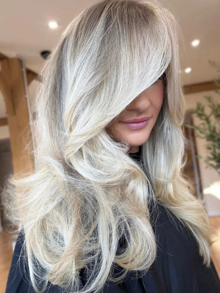 Mid-Back Length Platinum Blonde With Ash Tones Blowout, Layers Mid-Back Length Platinum Blonde With Ash Tones Blowout, Layers — Icy Blonde