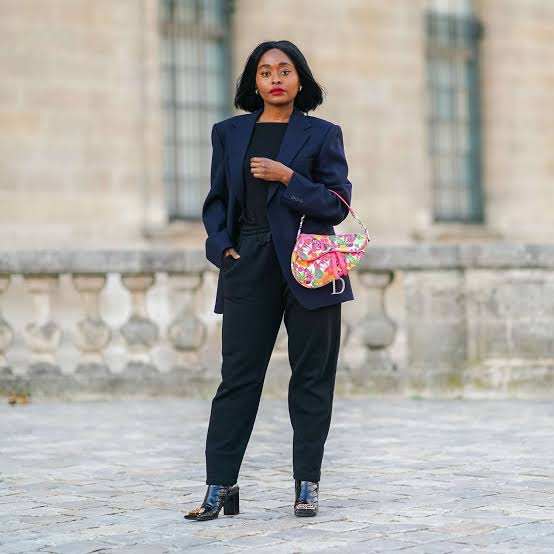 Navy blazer over a black t-shirt and relaxed trousers Navy blazer over a black t-shirt and relaxed trousers — Interview Outfits