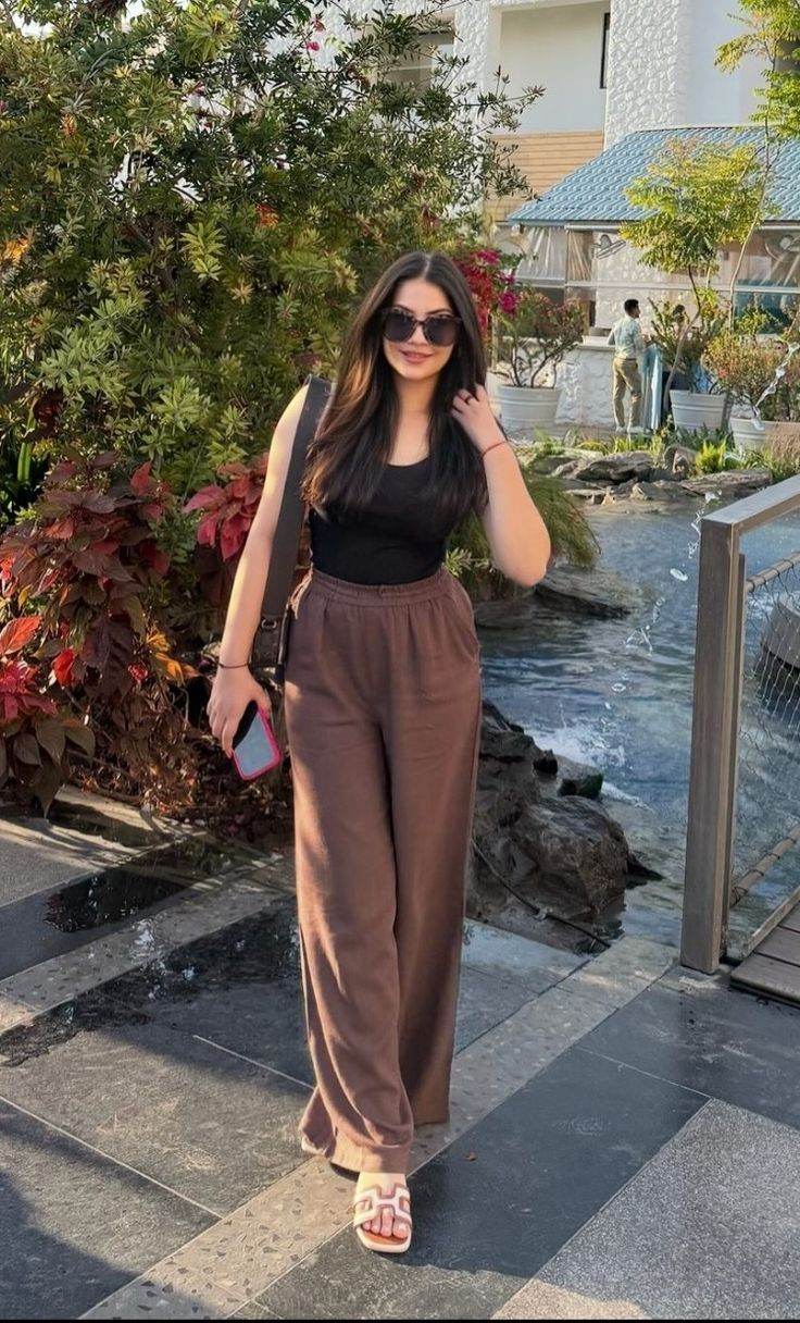 Black Tank Top and Wide Leg Trousers Black Tank Top and Wide Leg Trousers — It Girl Outfits