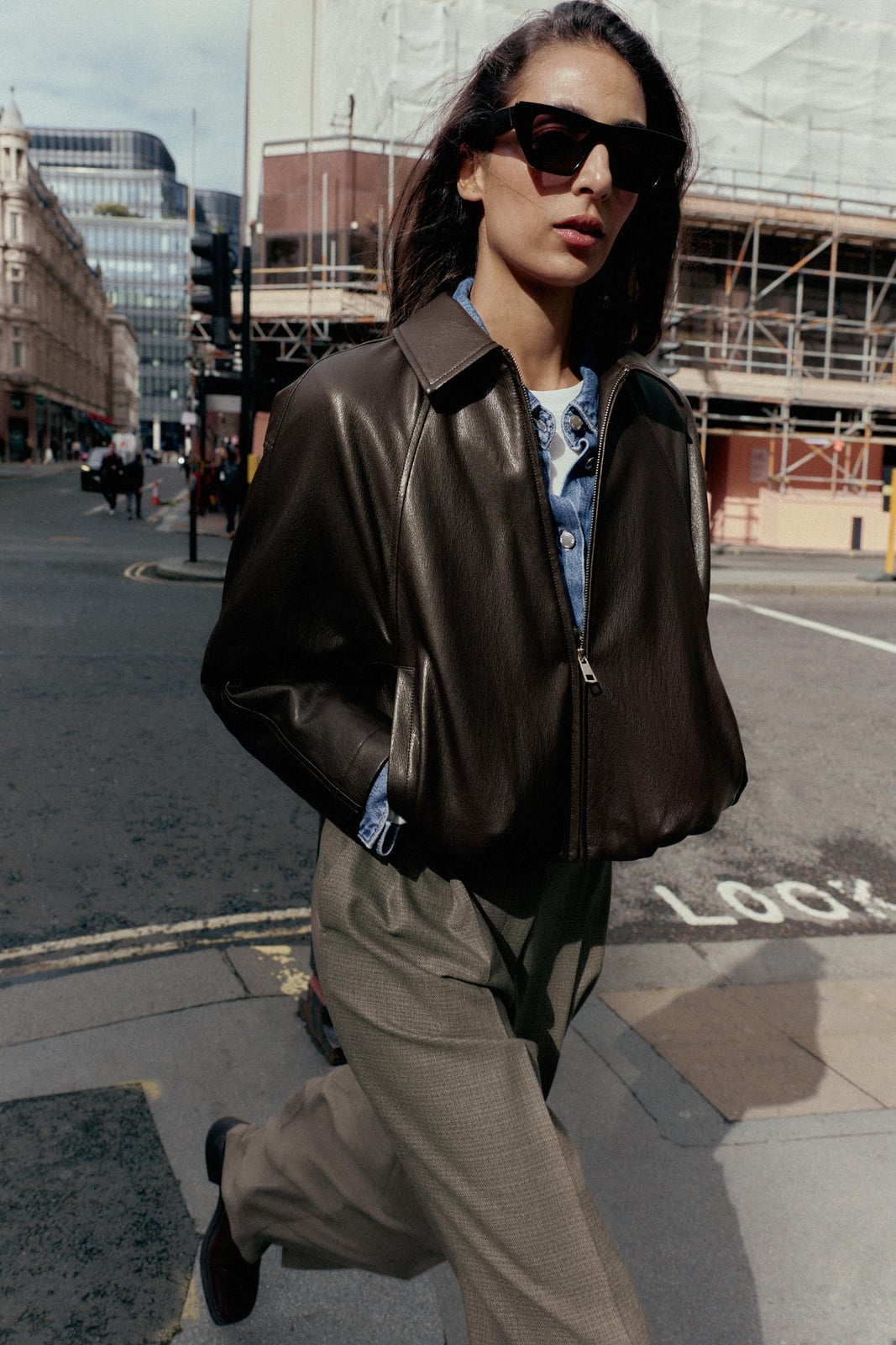 Oversized dark brown leather bomber jacket with gray trousers Oversized dark brown leather bomber jacket with gray trousers — Jacket Outfits