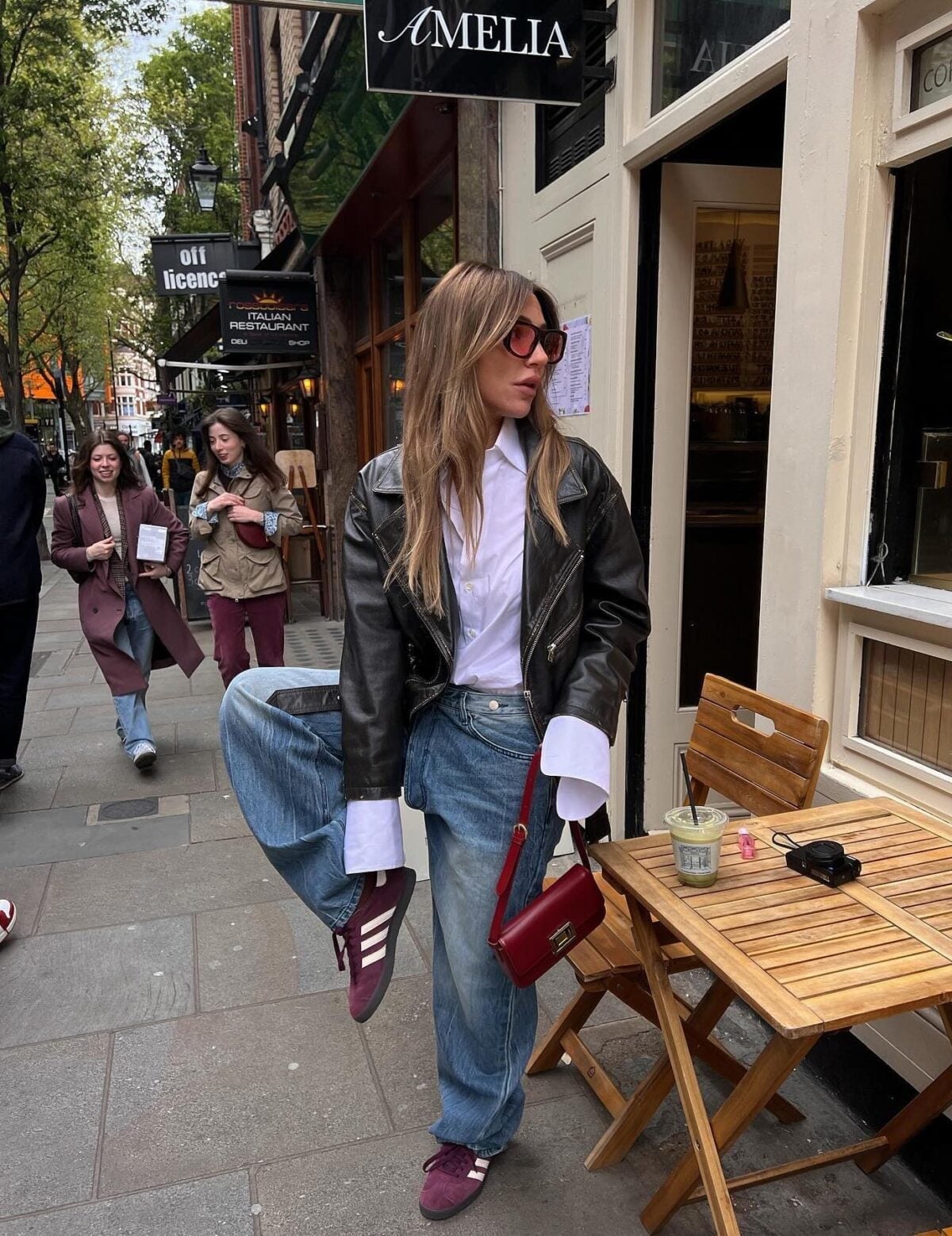 Black leather biker jacket with wide-leg jeans Black leather biker jacket with wide-leg jeans — Jacket Outfits
