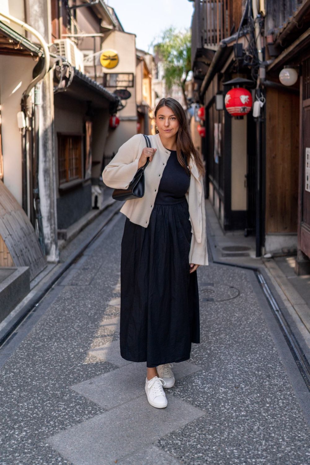 Cream cardigan over black midi dress Cream cardigan over black midi dress — Japan Outfits