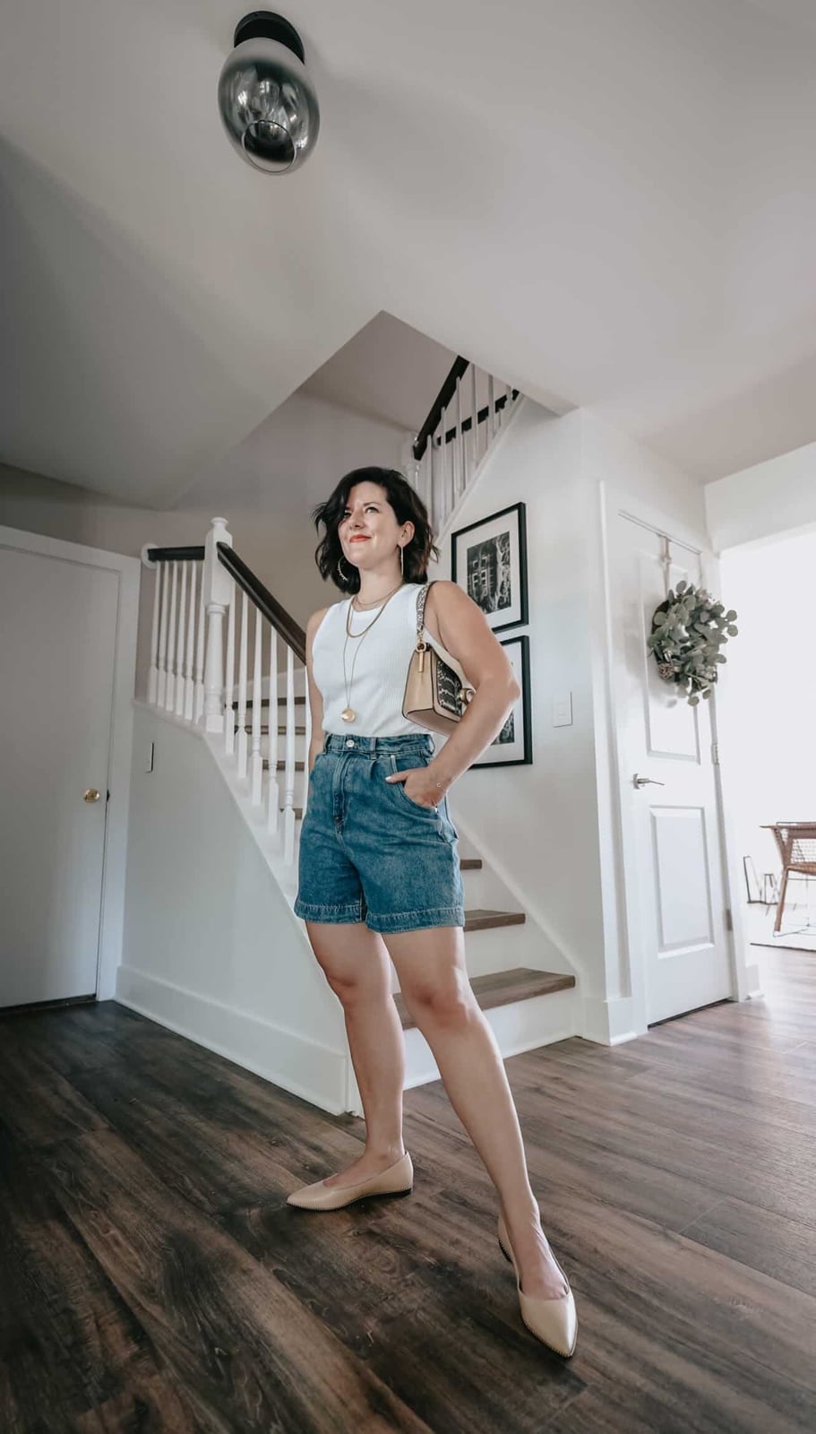 High-waisted denim shorts with a white sleeveless top High-waisted denim shorts with a white sleeveless top — Jean Shorts Outfits