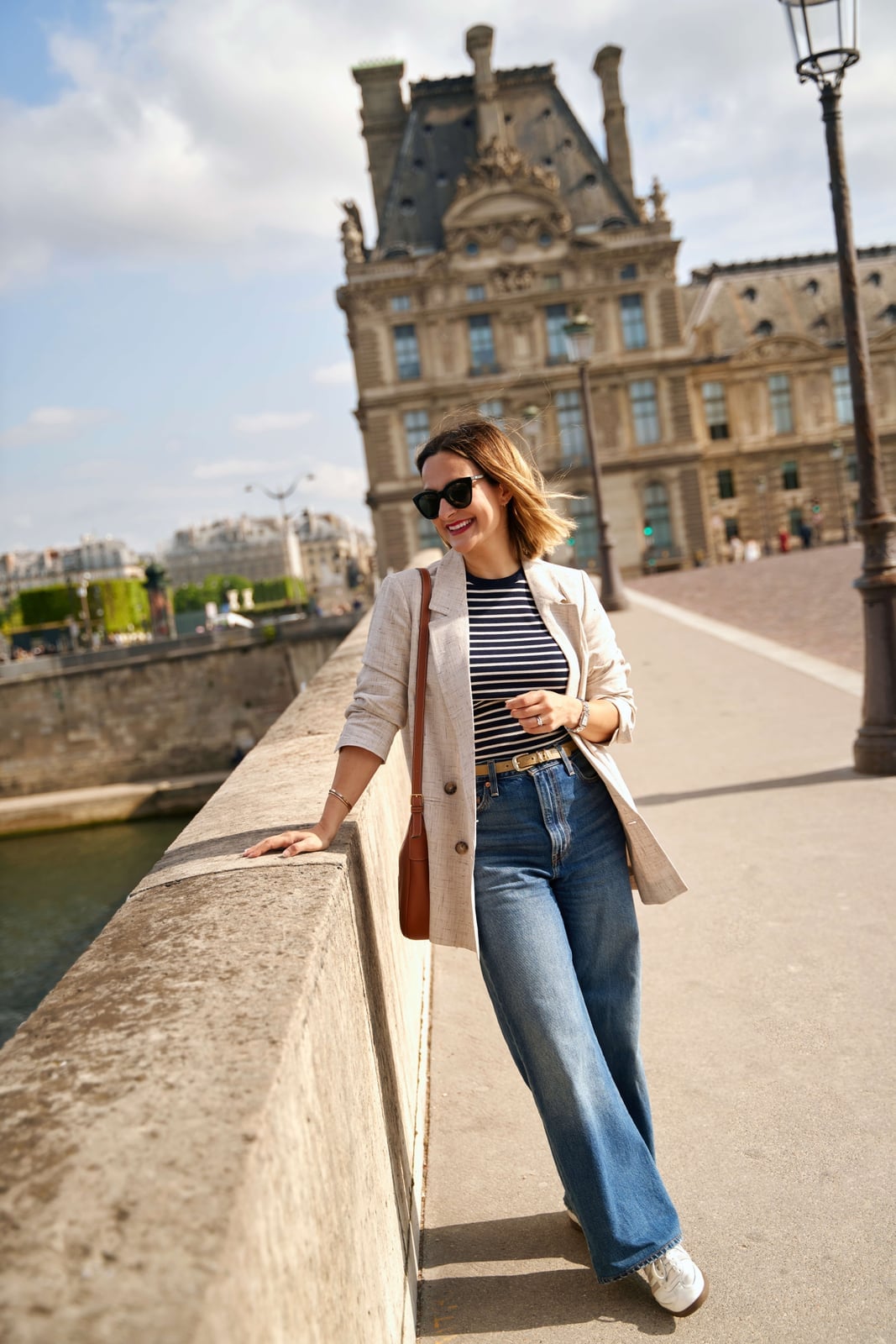 Medium wash wide leg jeans with striped t-shirt and beige blazer Medium wash wide leg jeans with striped t-shirt and beige blazer — Jeans Outfits
