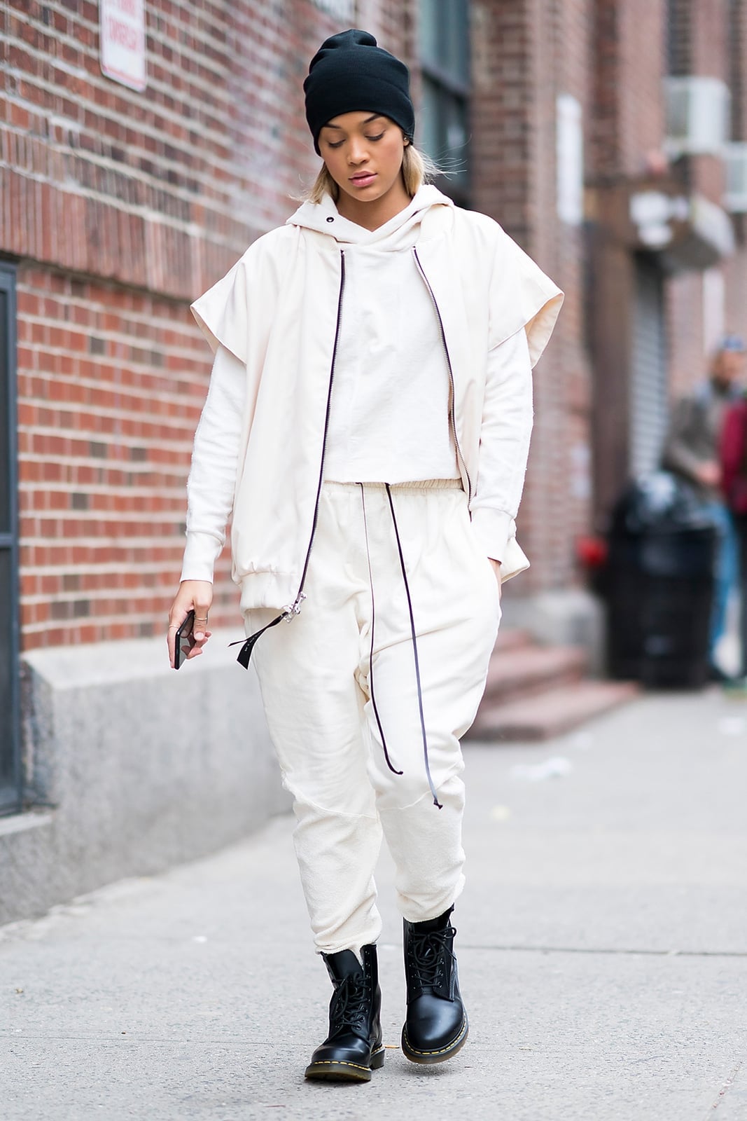Cream joggers with a vest over a hoodie and combat boots Cream joggers with a vest over a hoodie and combat boots — Jogging Outfits