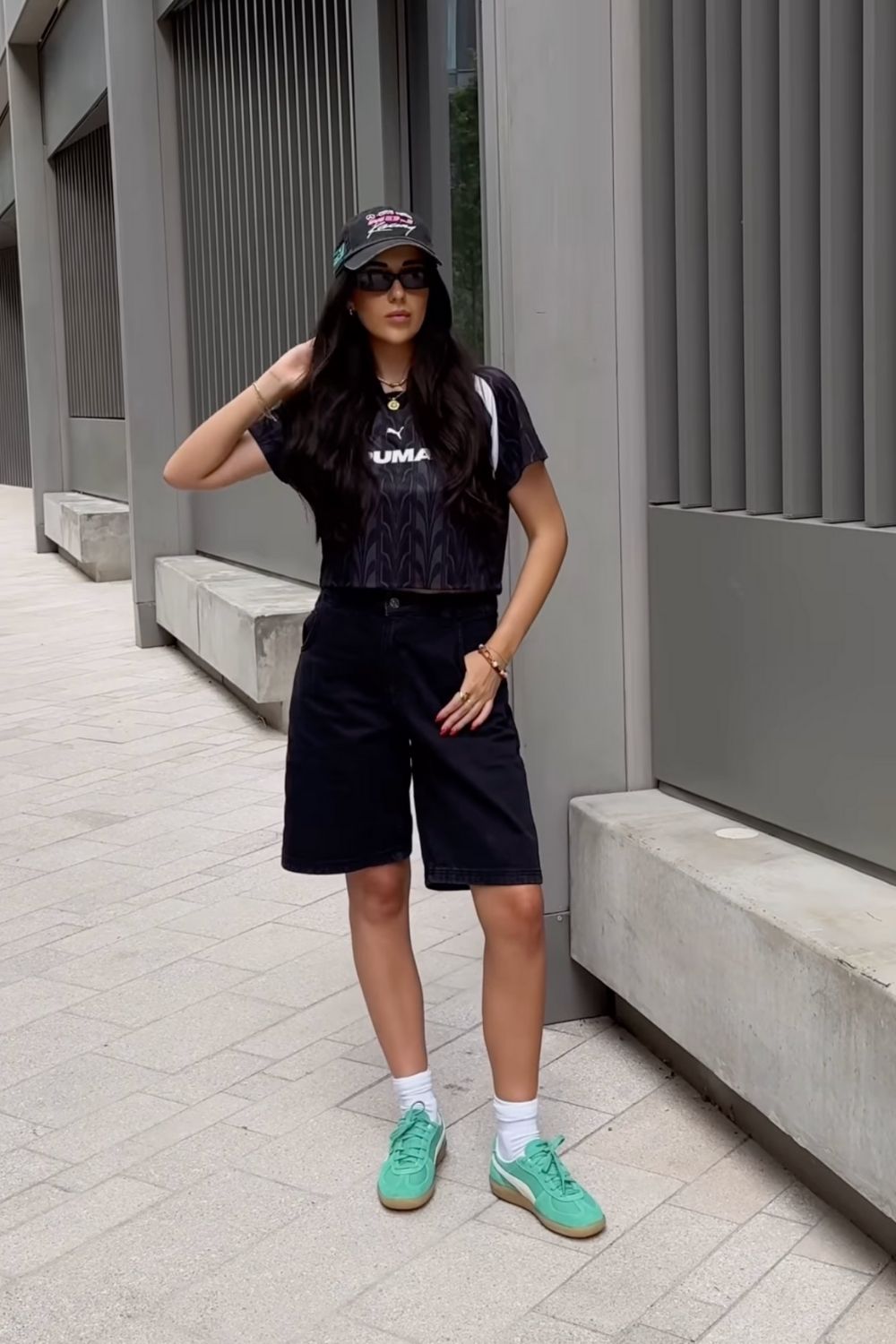 Black Jorts with Graphic Tee and Green Sneakers Black Jorts with Graphic Tee and Green Sneakers — Jorts Outfits