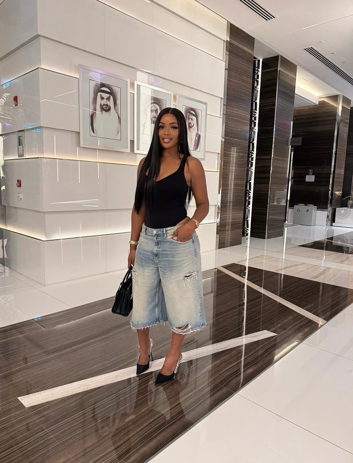 Distressed Denim Shorts with Tank Top and Heels, Close-Up Take Distressed Denim Shorts with Tank Top and Heels, Close-Up Take — Jorts Outfits