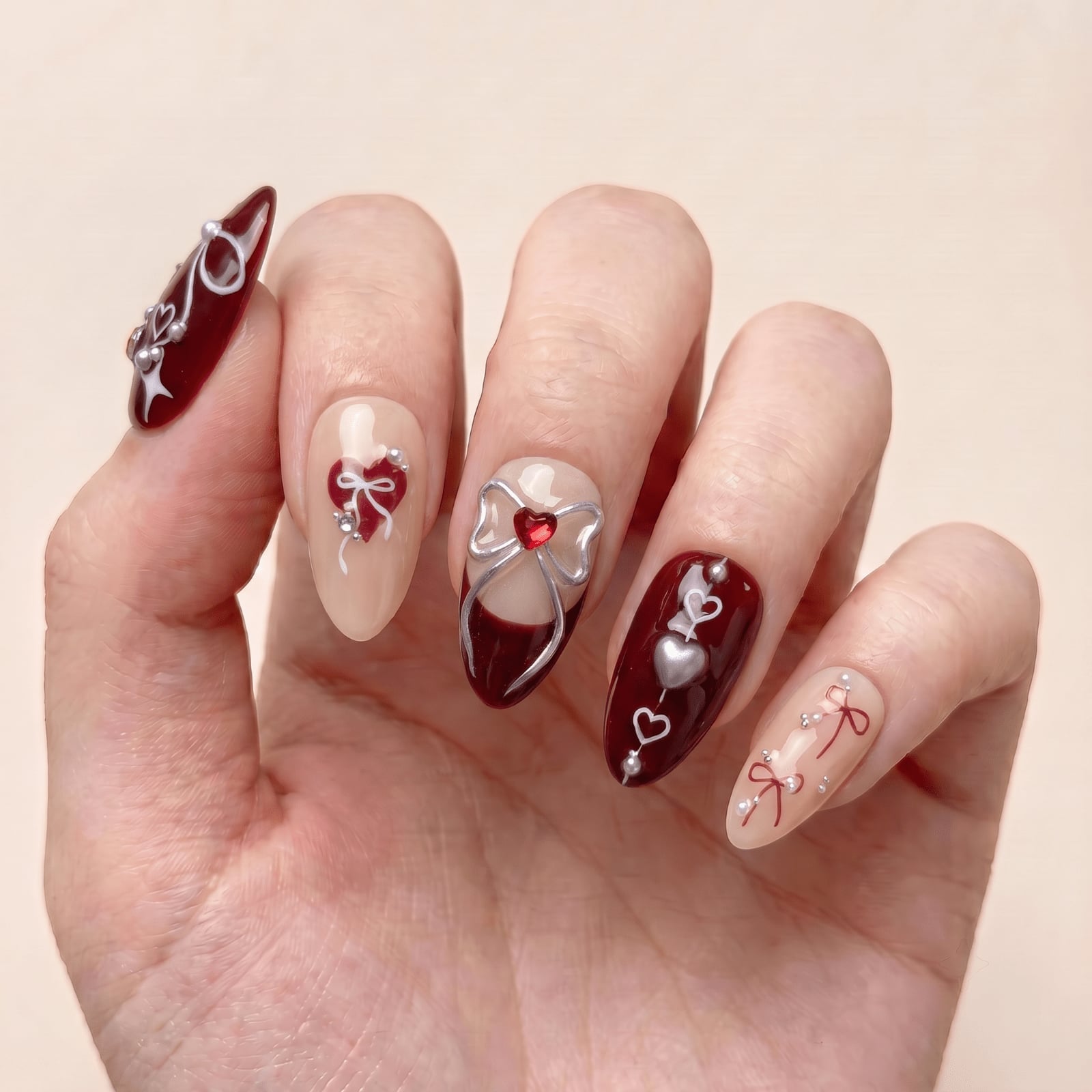 Medium Almond Red Heart Bow Nails Medium Almond Red Heart Bow Nails — Lace Nails