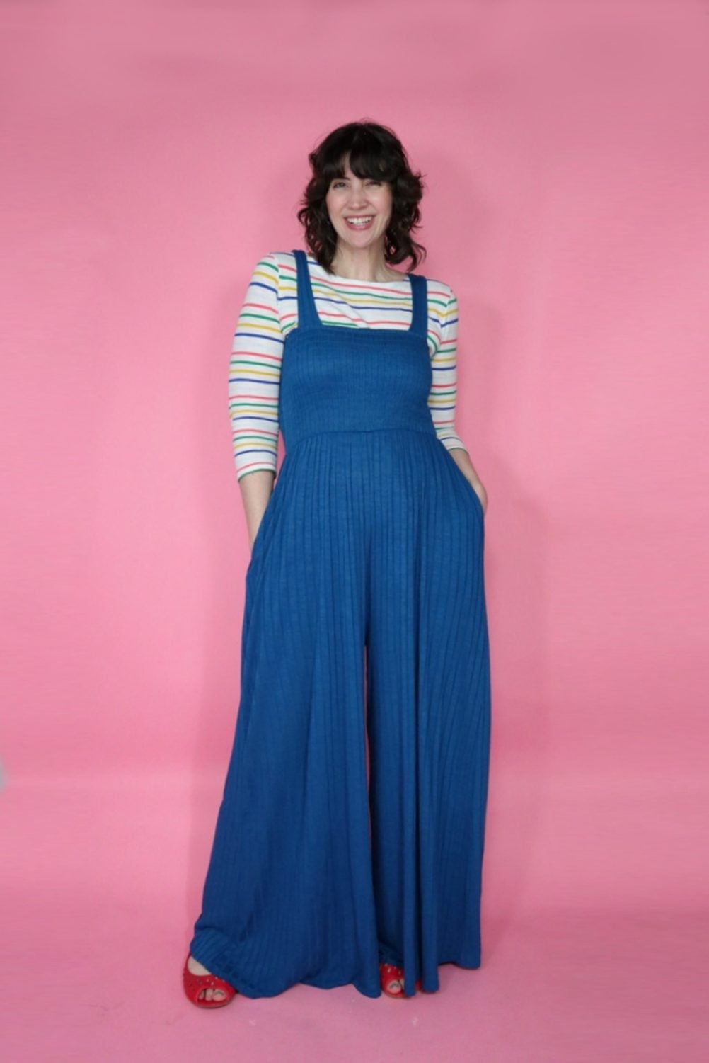 Vibrant blue jumpsuit with striped layering Vibrant blue jumpsuit with striped layering — Lazy Outfits