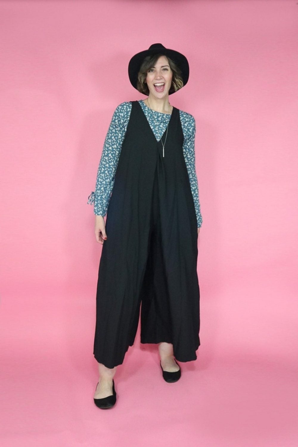 Black wide-leg jumpsuit over a printed blouse Black wide-leg jumpsuit over a printed blouse — Lazy Outfits