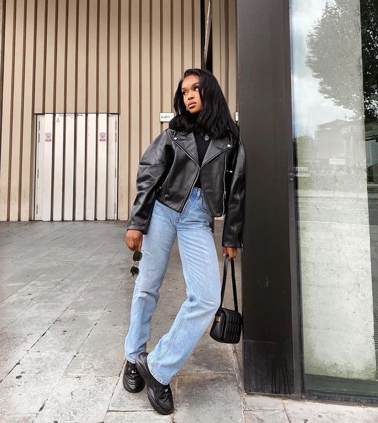 Black leather moto jacket with light blue relaxed jeans Black leather moto jacket with light blue relaxed jeans — Leather Jacket Outfits Women