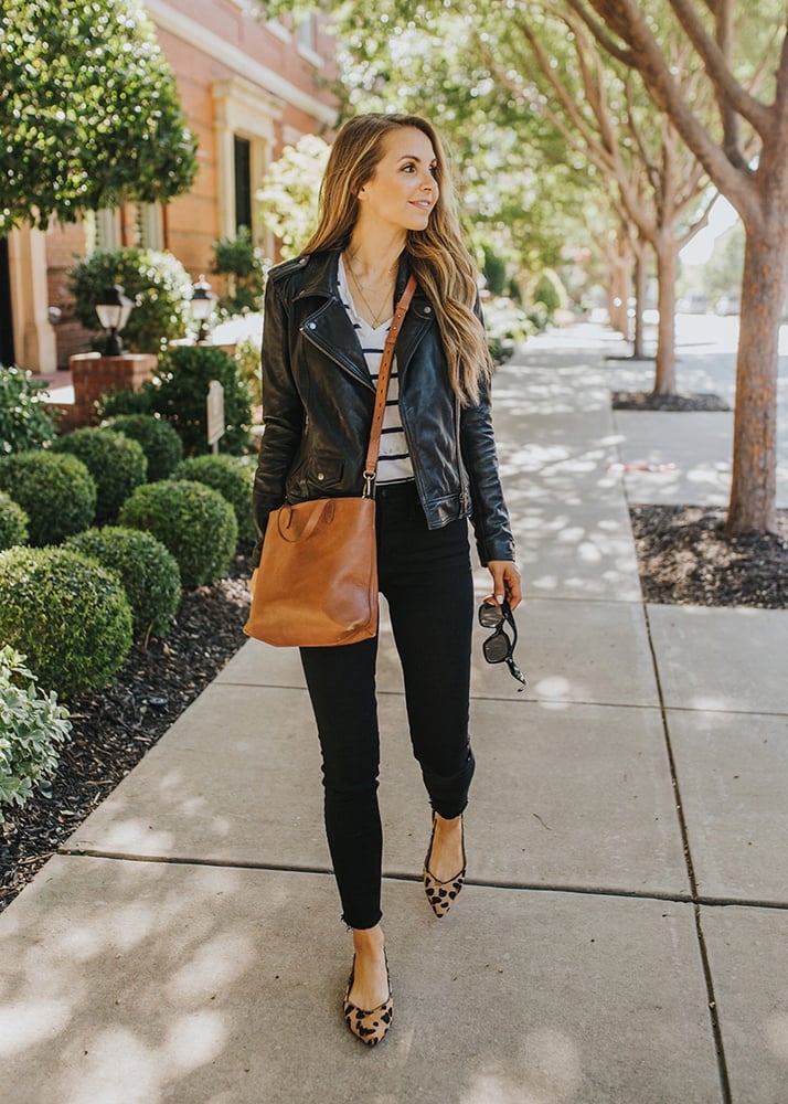 Black leather moto jacket with striped t-shirt, Office-Safe Version Black leather moto jacket with striped t-shirt, Office-Safe Version — Leather Jacket Outfits Women