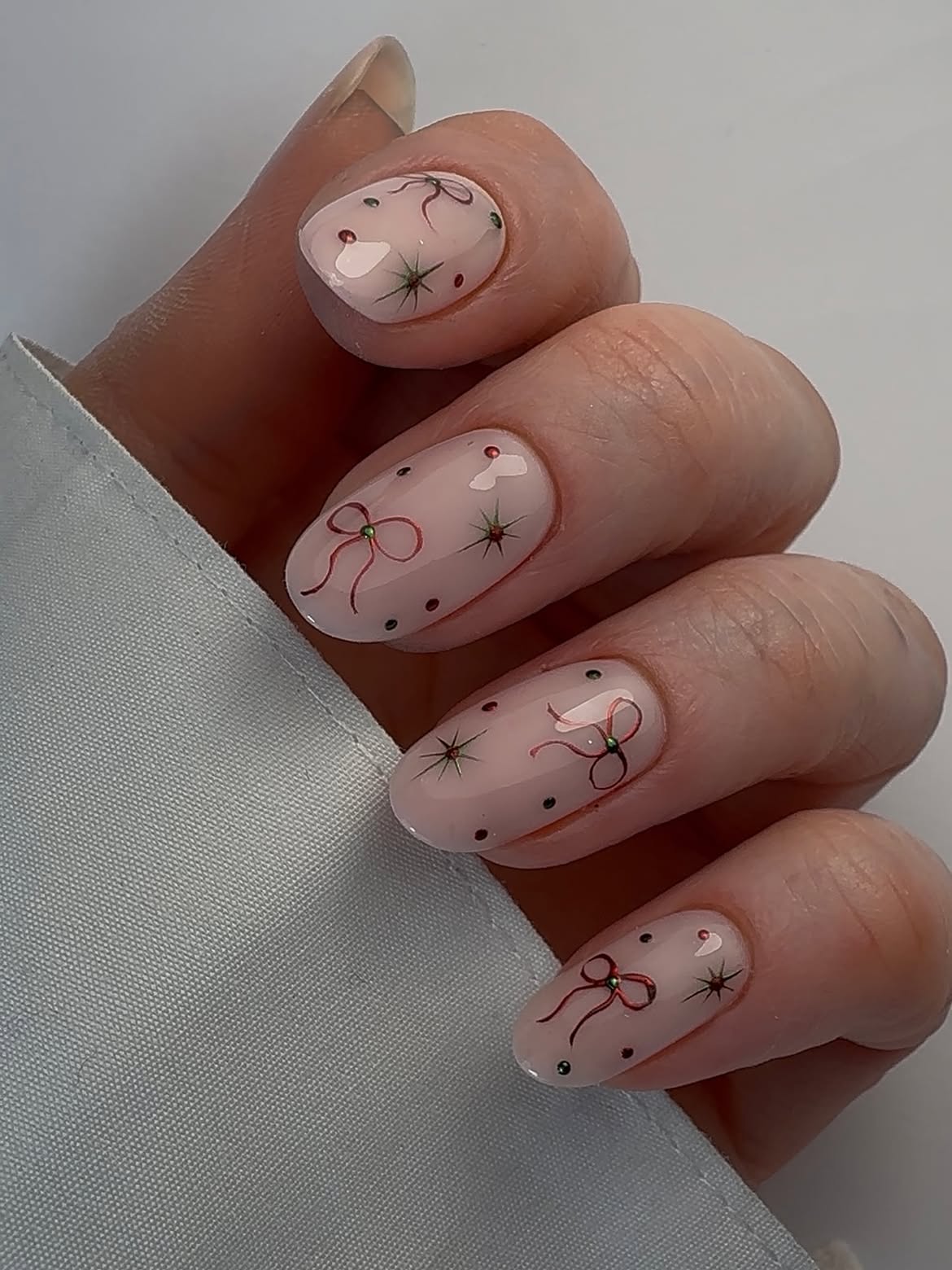 Light Pink Glossy Christmas Bow Oval Nails