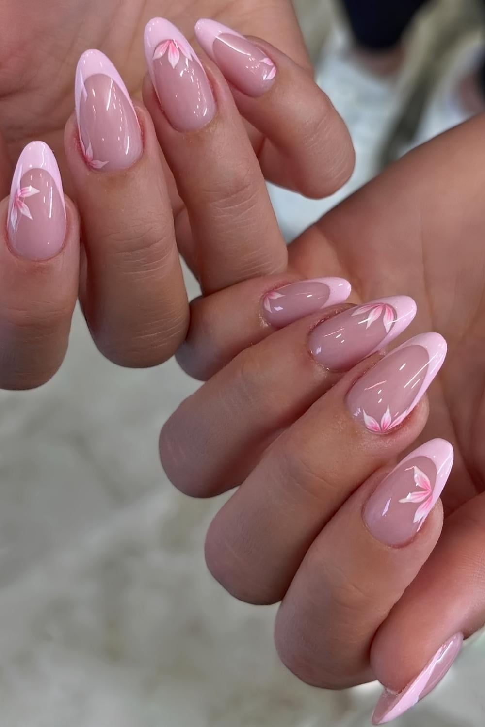 Nude Base Light Pink Tip Almond Nails With Floral Art Nude Base Light Pink Tip Almond Nails With Floral Art — Light Pink Nails