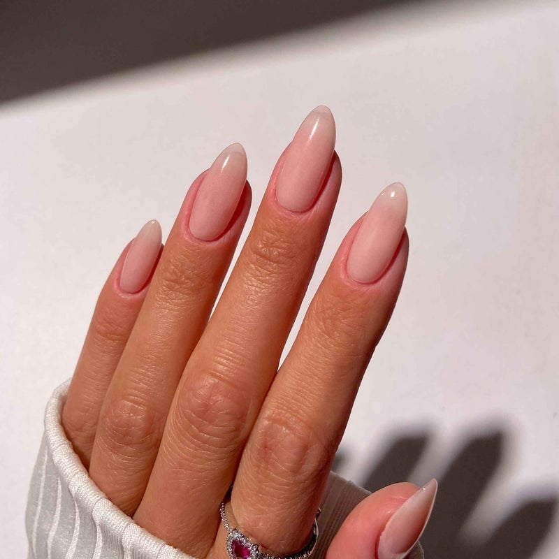 Sheer Nude Pink Glossy Medium Almond Nails, Offering A Natural Sheer Nude Pink Glossy Medium Almond Nails, Offering A Natural — Light Pink Nails