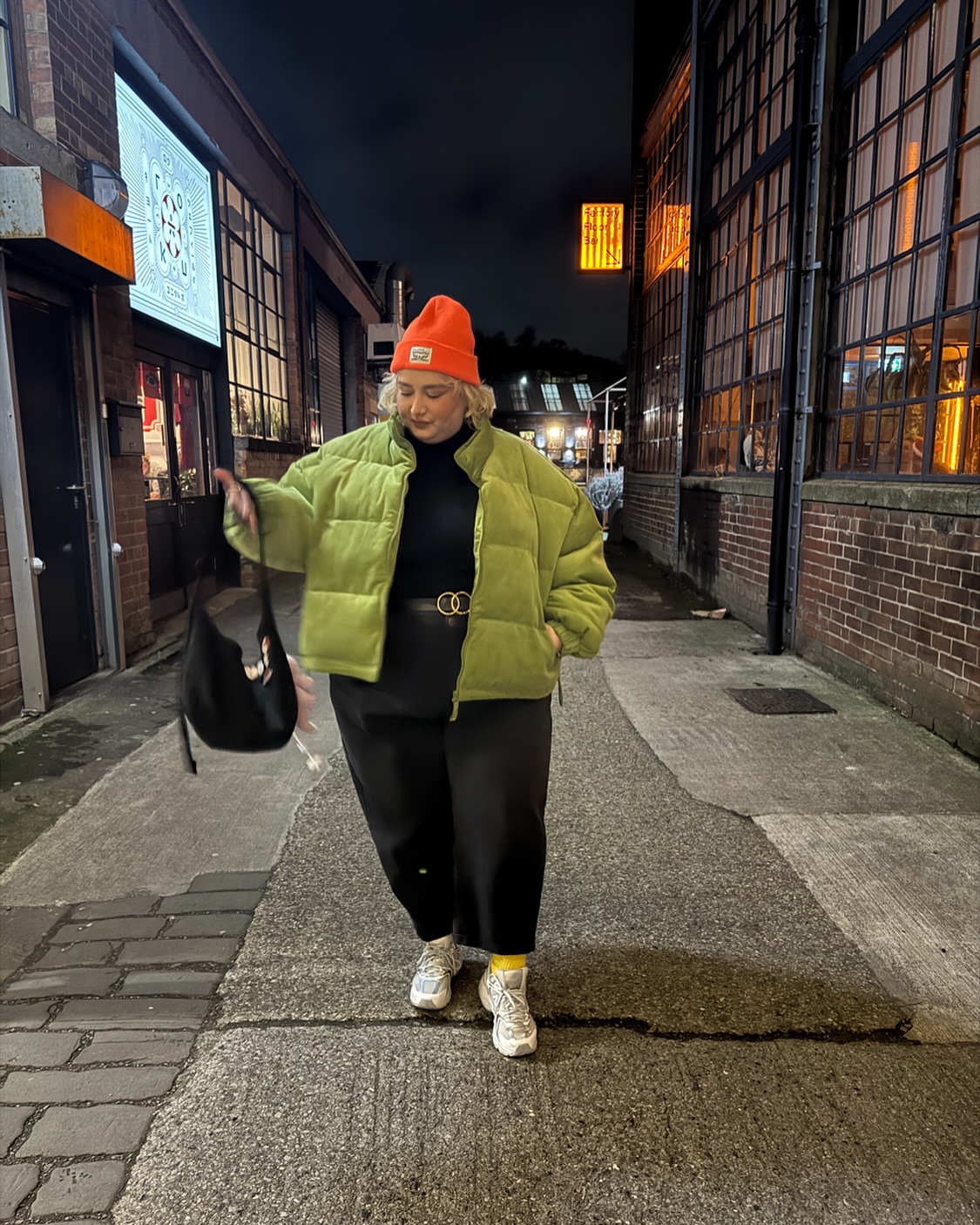 Lime Puffer And Black Trousers Winter Street Style